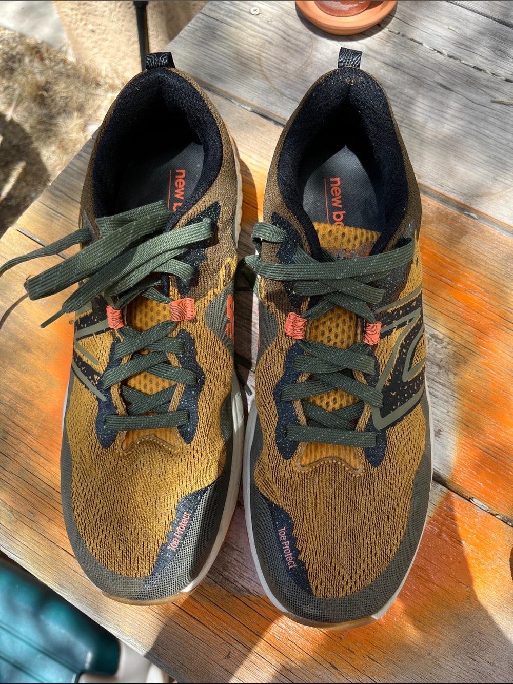 New Balance Black Sneaker with Orange Logo